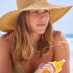 model in sunhat